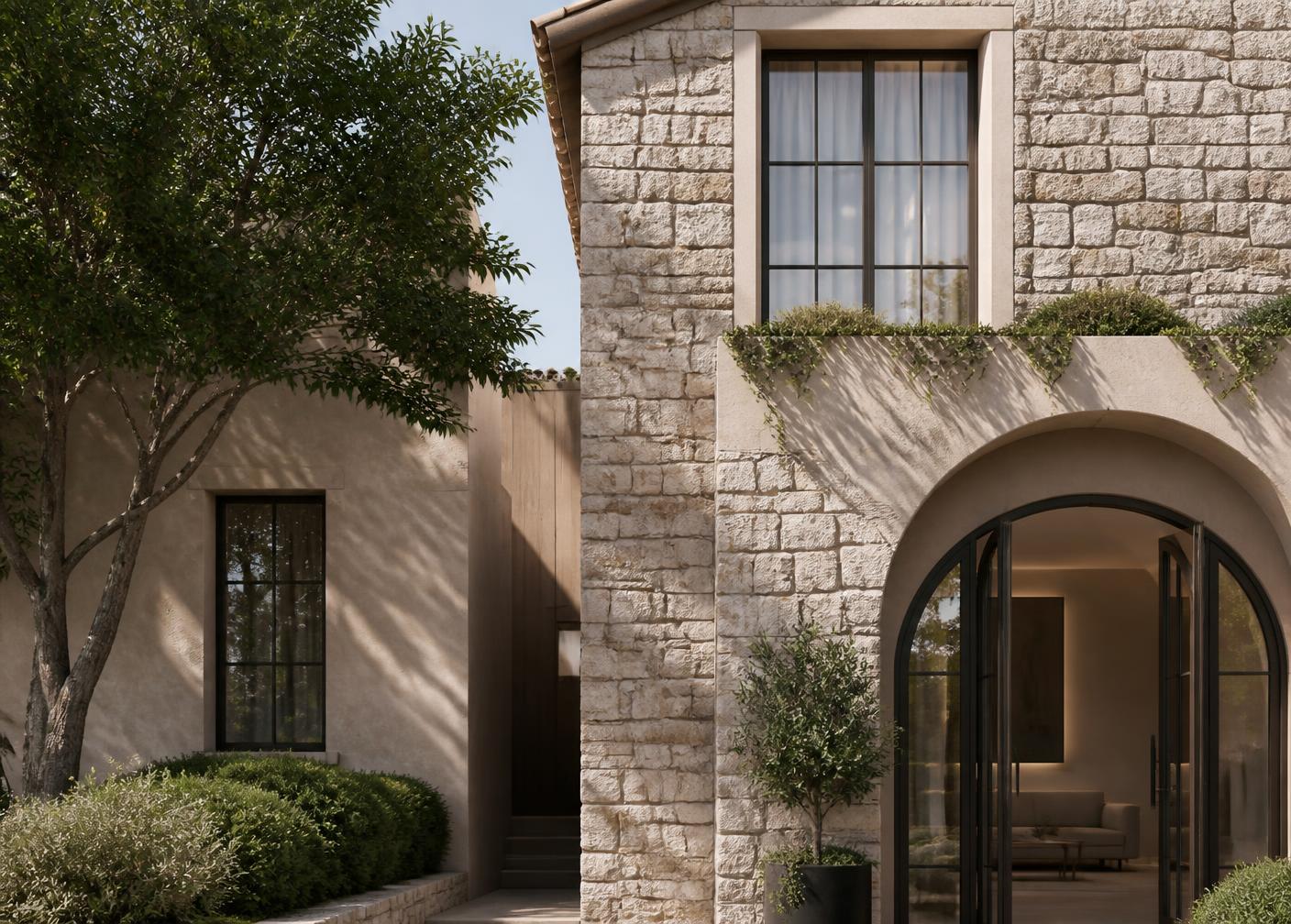 Arquitectura residencial contemporánea de piedra bajo luz natural